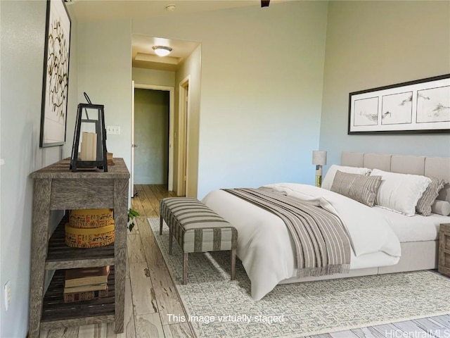 bedroom featuring hardwood / wood-style floors