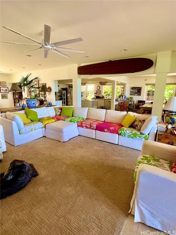 living room with ceiling fan