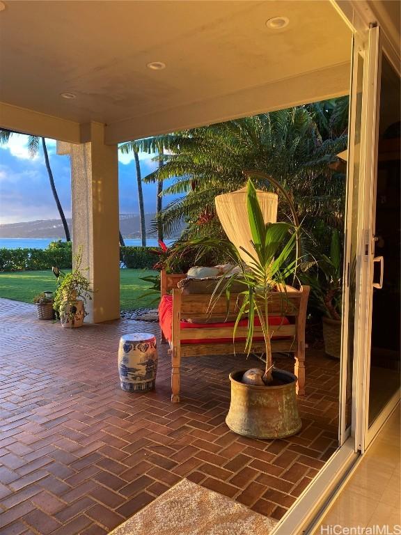 view of patio / terrace featuring a water view