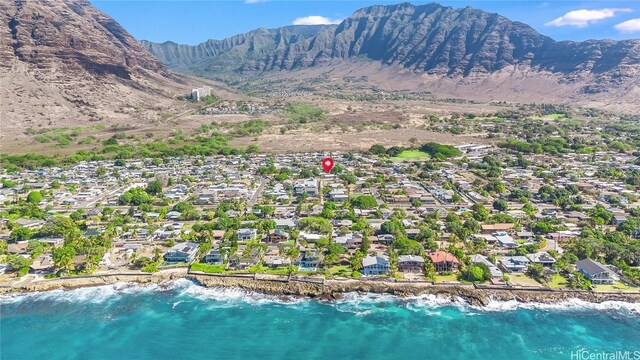 bird's eye view featuring a water and mountain view