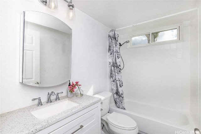 full bathroom featuring shower / bath combo, toilet, and vanity