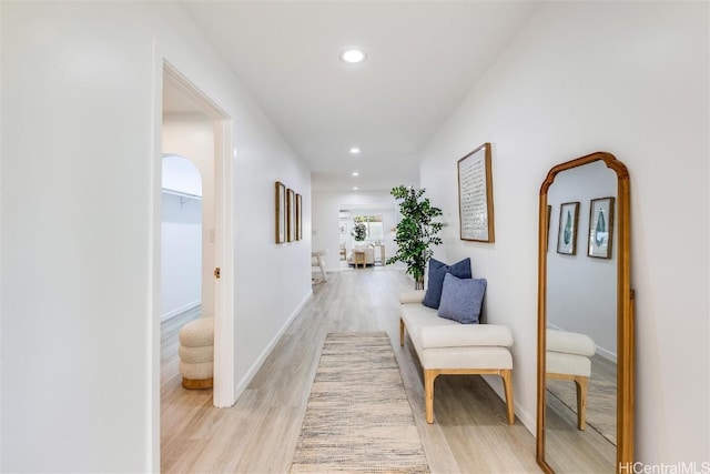 hallway with light wood-type flooring