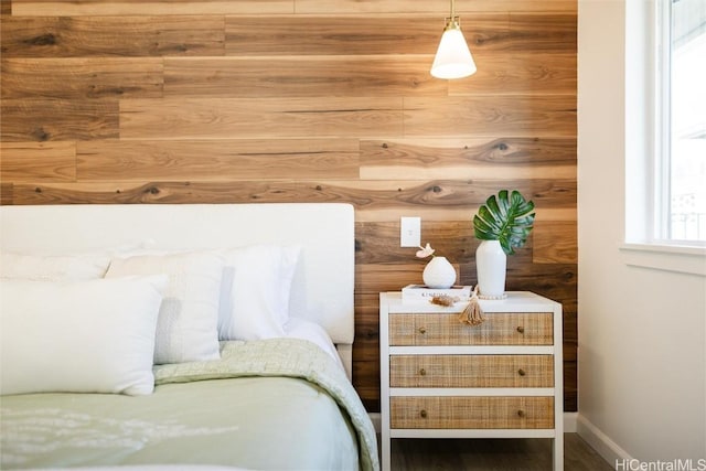 bedroom with wood-type flooring