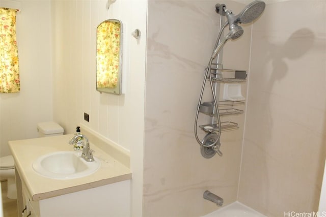 full bathroom with vanity, bathtub / shower combination, and toilet