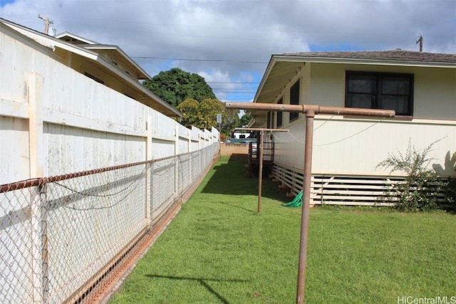 view of property exterior with a yard