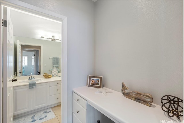 bathroom featuring tile patterned floors and vanity