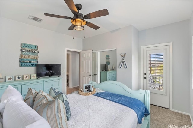 carpeted bedroom featuring ceiling fan