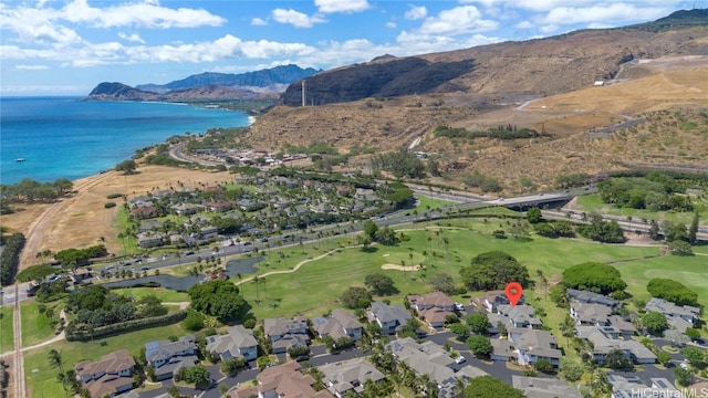 aerial view featuring a water and mountain view