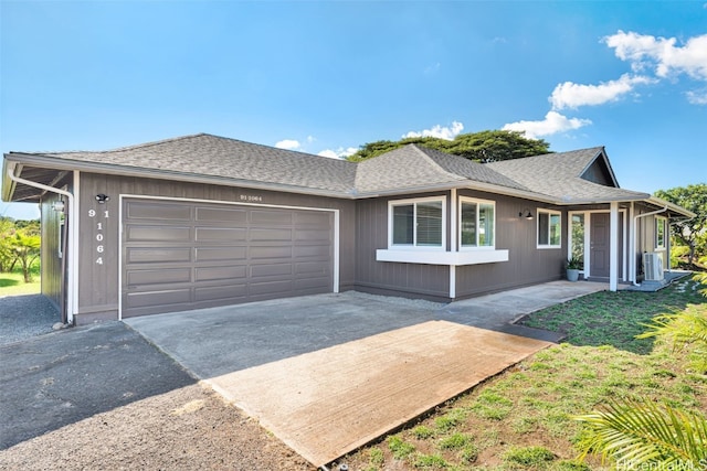 ranch-style house featuring a garage