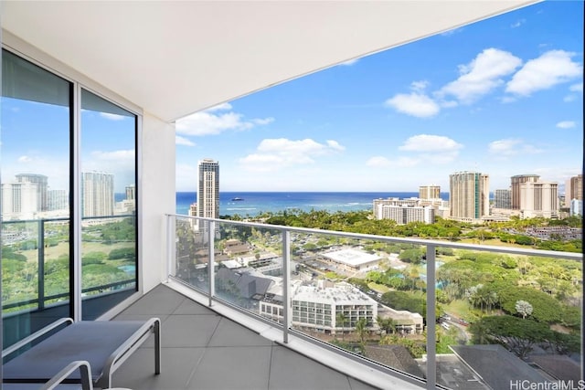 balcony featuring a water view