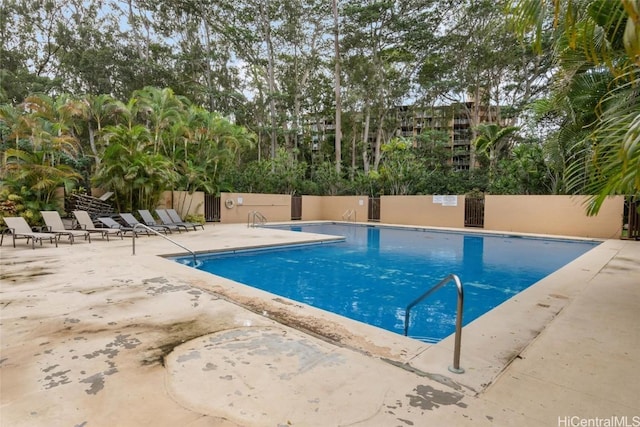 view of pool featuring a patio area