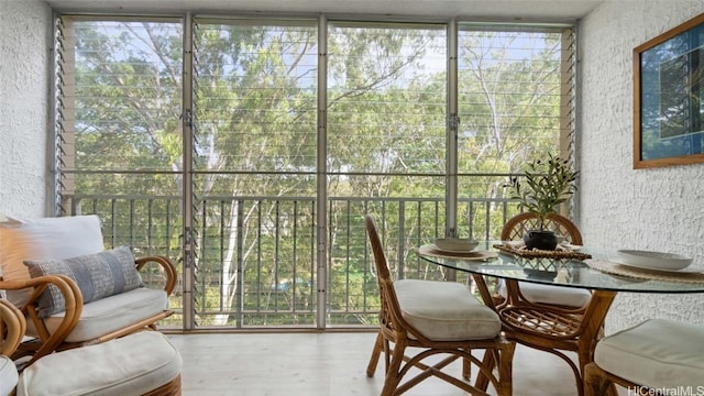 sunroom / solarium with a wealth of natural light