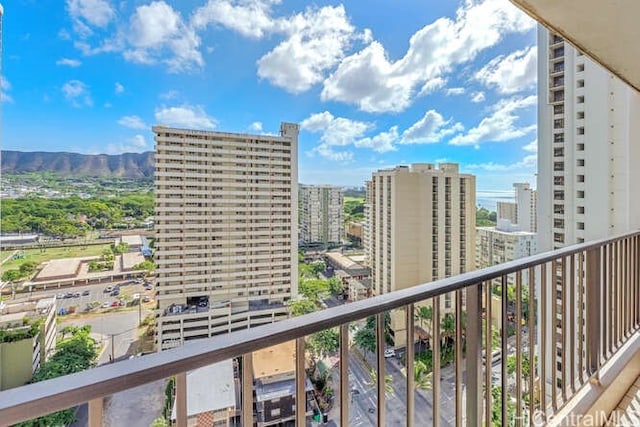 balcony featuring a mountain view