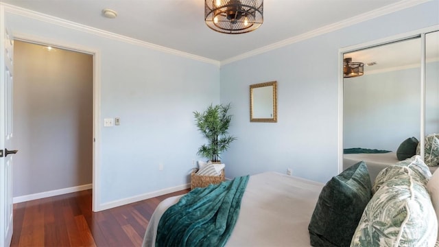 bedroom featuring ornamental molding and dark wood-type flooring