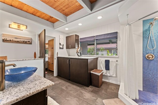 bathroom featuring vanity, a shower with curtain, wooden ceiling, and beamed ceiling