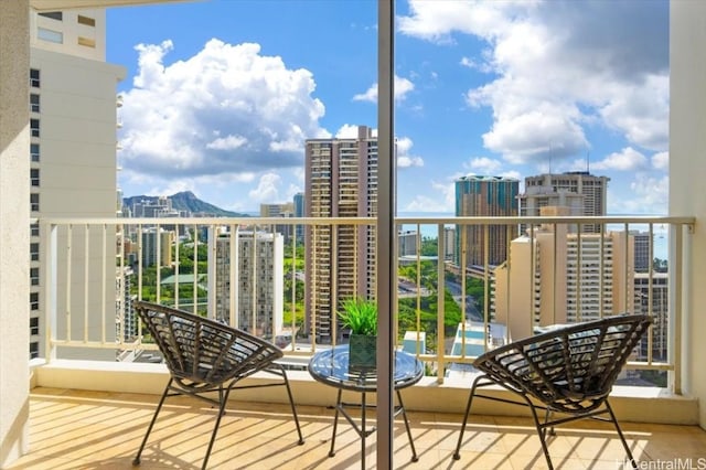 balcony featuring a mountain view