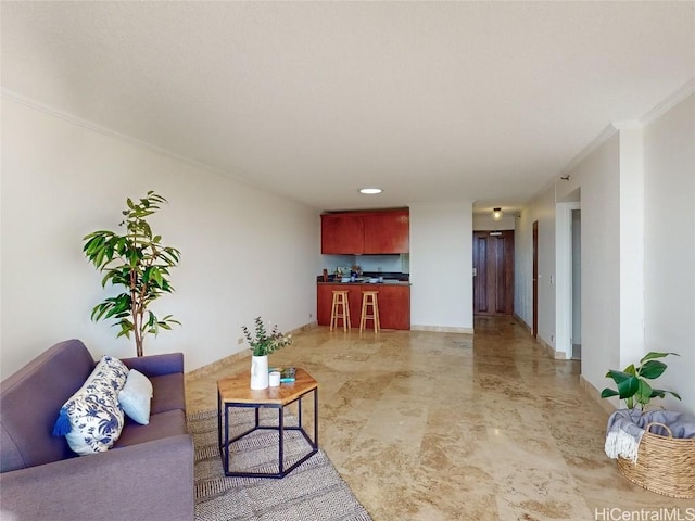 living room featuring crown molding