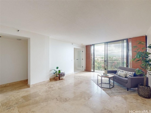 living room with floor to ceiling windows