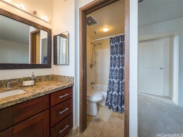 full bathroom with shower / bath combo, toilet, and vanity