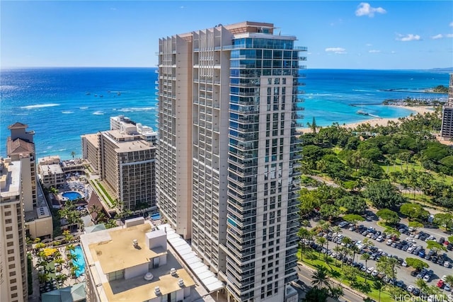 drone / aerial view featuring a view of the beach and a water view