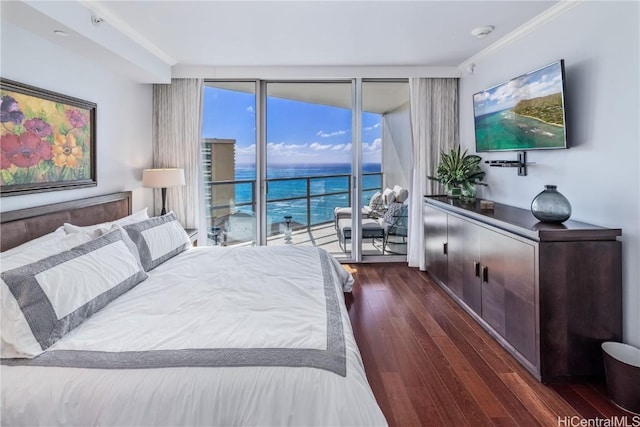 bedroom with access to outside, floor to ceiling windows, crown molding, and dark hardwood / wood-style floors