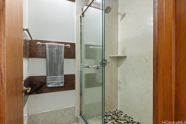 bathroom with an enclosed shower