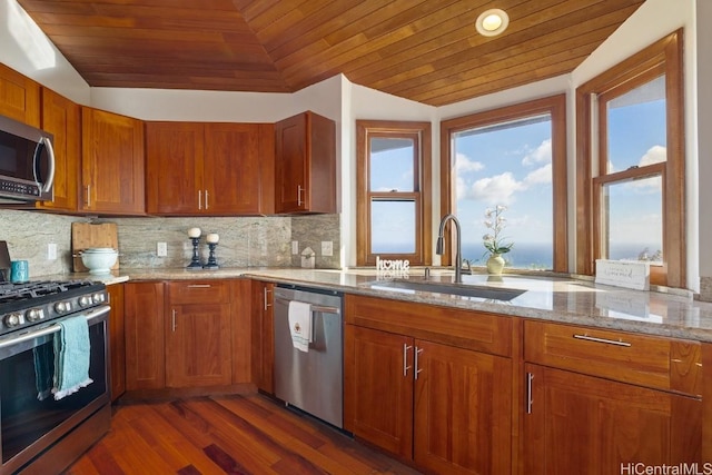 kitchen featuring wooden ceiling, sink, dark hardwood / wood-style flooring, light stone counters, and stainless steel appliances