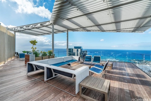 wooden terrace featuring a pergola and a water view