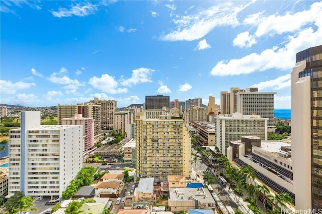 property's view of city featuring a water view