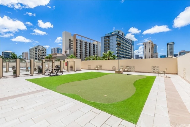 surrounding community with a patio