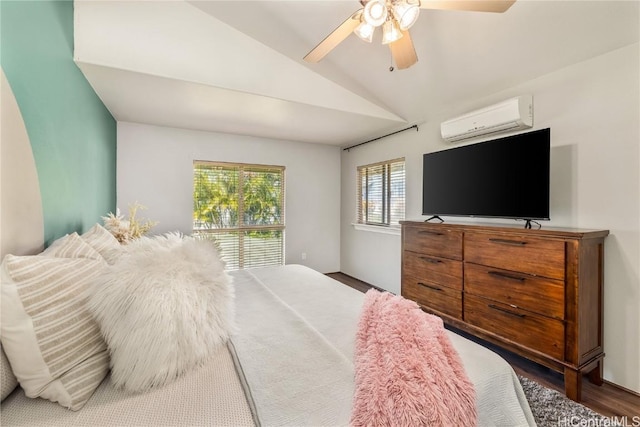 bedroom with a wall mounted air conditioner, dark wood-type flooring, ceiling fan, and lofted ceiling