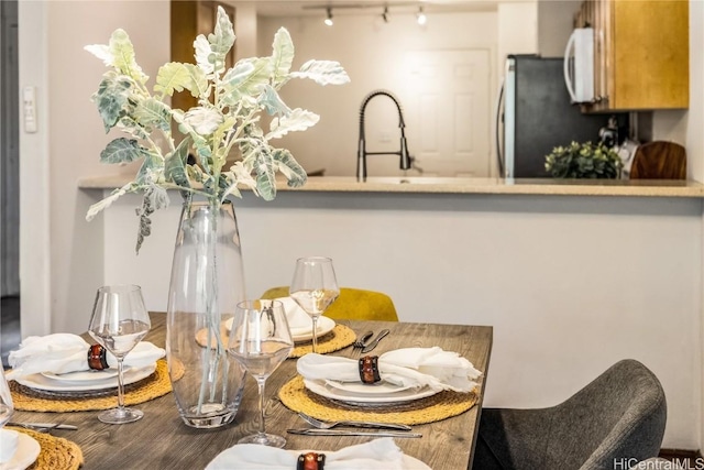 dining room featuring sink