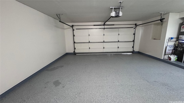 87-141 Kulahelela Pl, Waianae, HI 96792 - garage with baseboards and a garage door opener