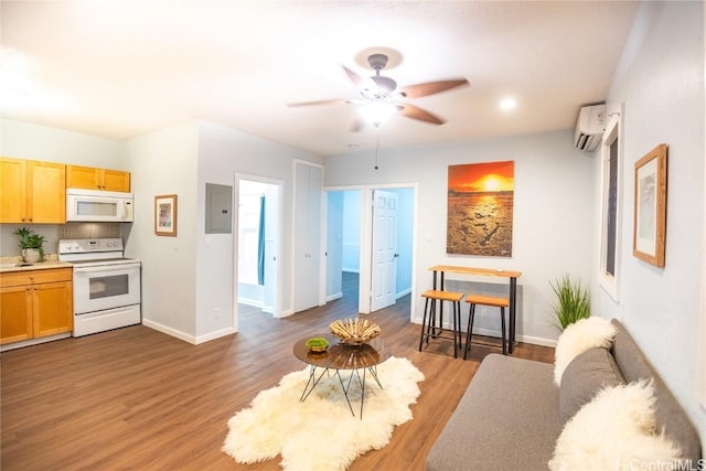 living room featuring wood-type flooring, electric panel, an AC wall unit, and ceiling fan