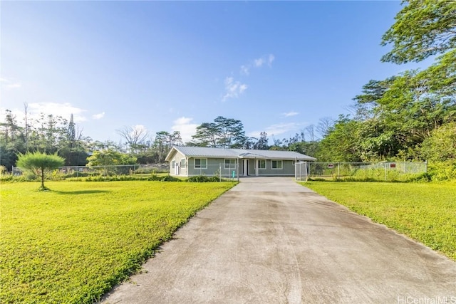 single story home featuring a front lawn and a carport