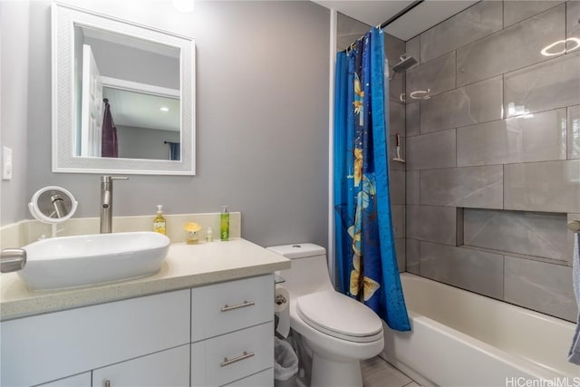 full bathroom with shower / bathtub combination with curtain, vanity, and toilet