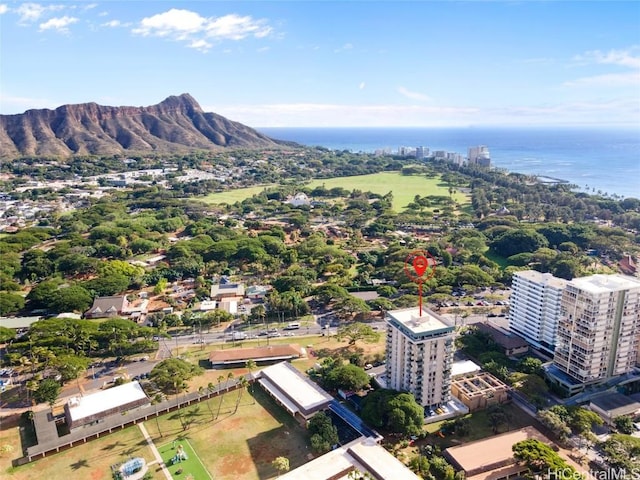 aerial view featuring a water and mountain view