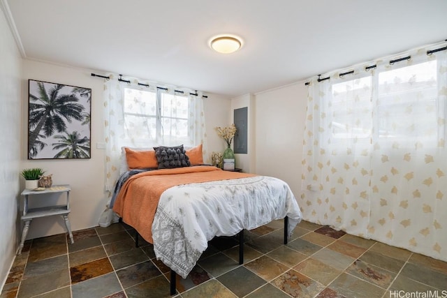 bedroom with crown molding