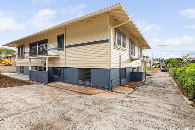 view of property exterior with cooling unit