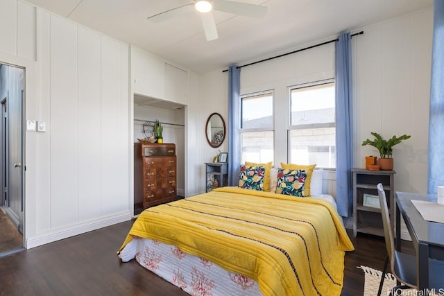 bedroom featuring ceiling fan and dark hardwood / wood-style floors