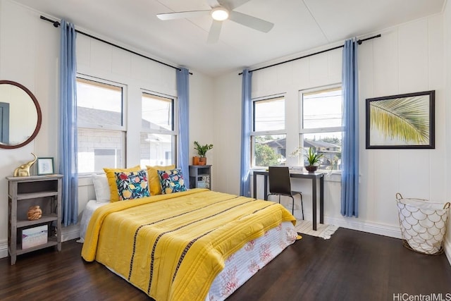 bedroom featuring ceiling fan and dark wood-type flooring