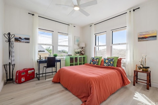 bedroom featuring ceiling fan and light wood-type flooring