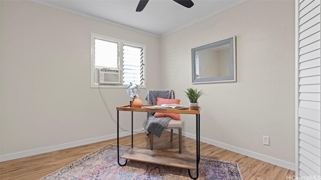 office area featuring hardwood / wood-style flooring, cooling unit, and ornamental molding