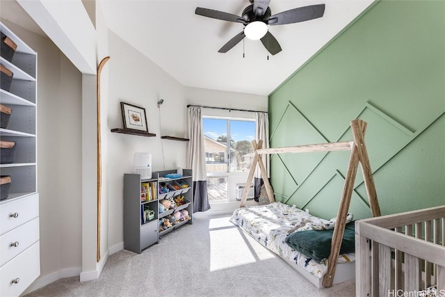 carpeted bedroom with ceiling fan