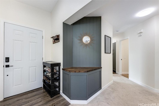 hallway with wood-type flooring