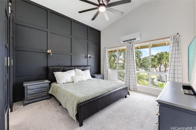 carpeted bedroom with vaulted ceiling, a wall mounted AC, and ceiling fan