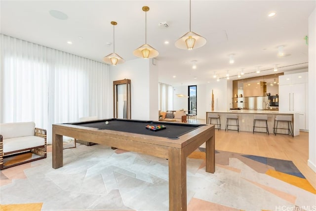 playroom featuring a wealth of natural light, pool table, and track lighting