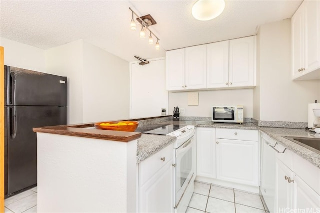 kitchen with a textured ceiling, kitchen peninsula, white cabinets, and white appliances