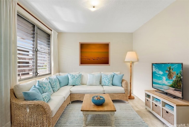 living room with light tile patterned floors