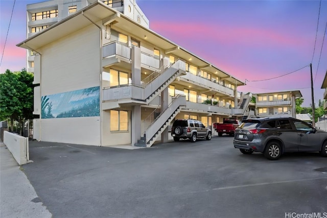 view of outdoor building at dusk